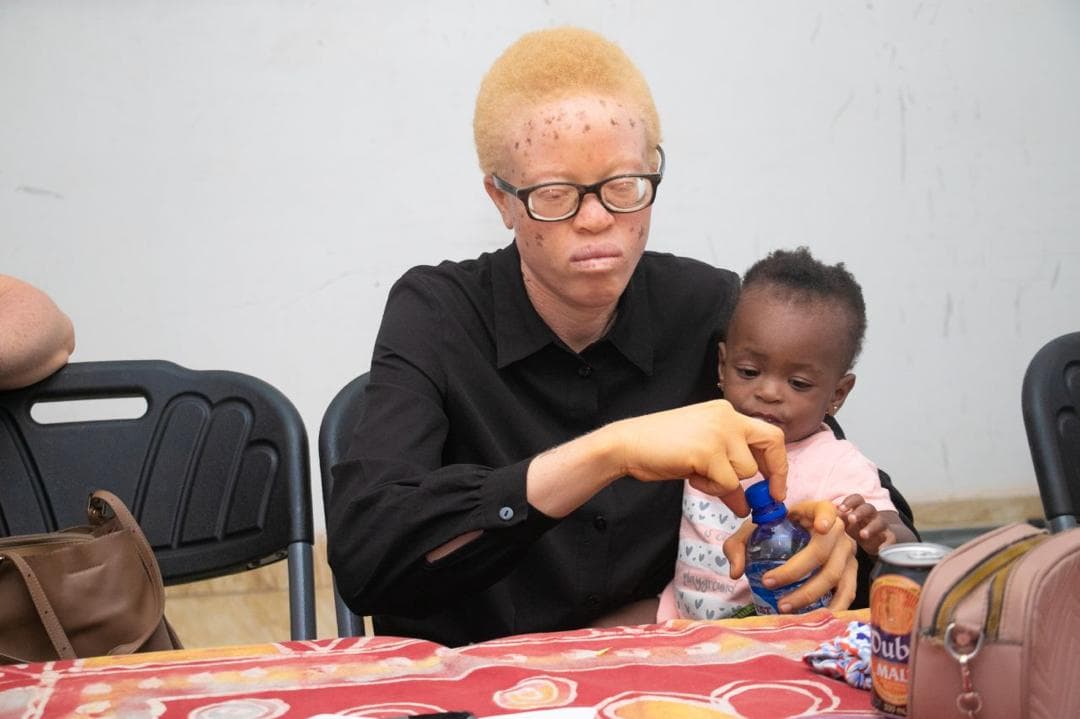 Mother and child during community event